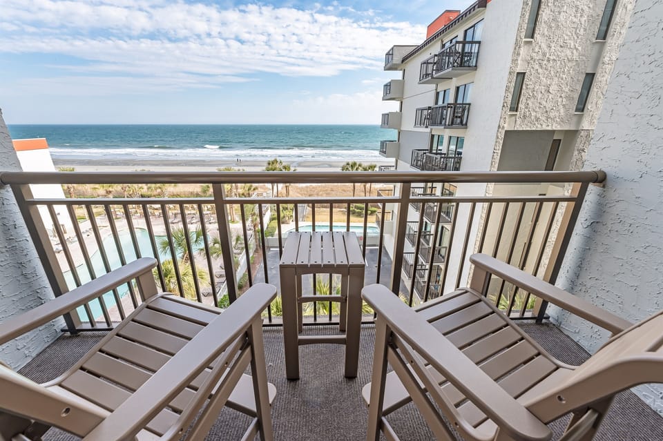 - Start your morning with coffee & endless ocean views right from your private balcony - Relax in these comfy chairs, soak in the sea breeze, & enjoy the perfect coastal escape - From sunrise to sunset, this is the best spot to unwind & take it all in