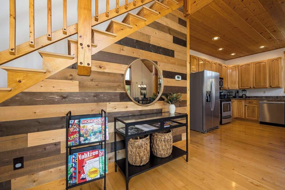 Stylishly designed with warm woods, a game corner, and modern charm awaits!