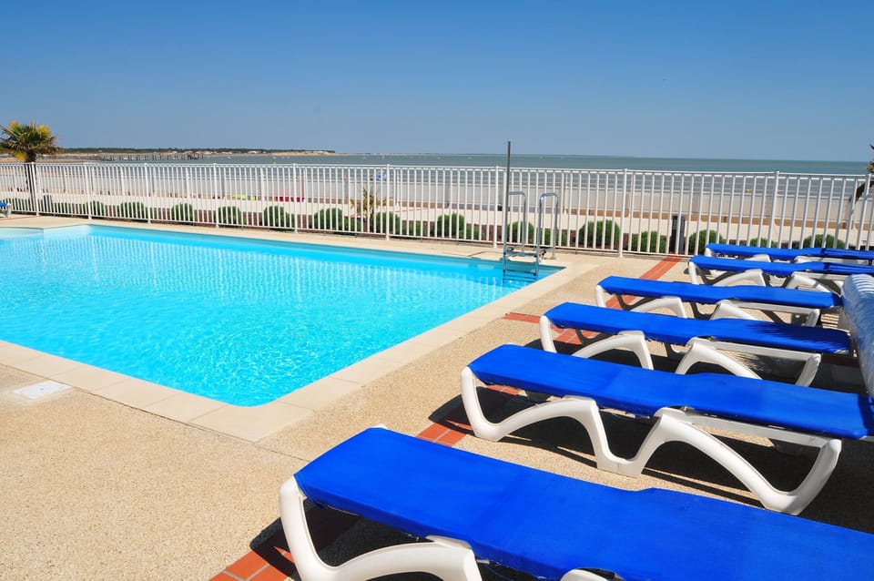 Take in gorgeous views while lounging around the on-site outdoor pool.