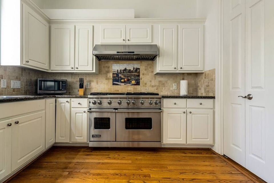 Fully equipped kitchen, complete with an additional small dinning table.