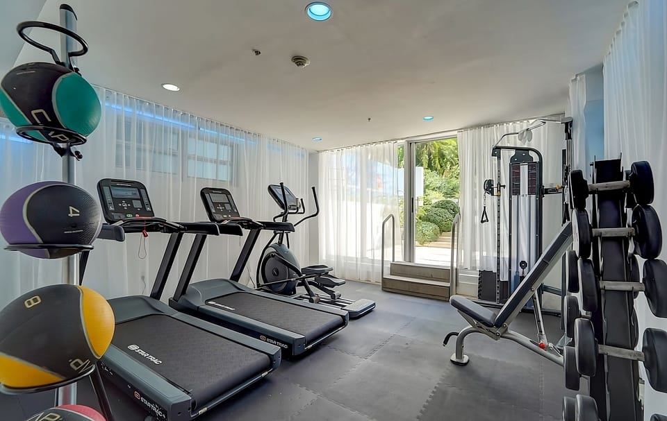 Recharge with a bright, well-equipped gym steps from your room.