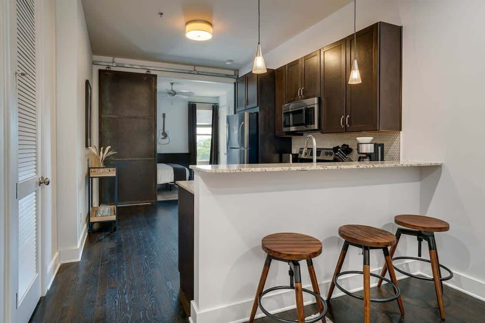 Fully equipped kitchen with stainless steel appliances