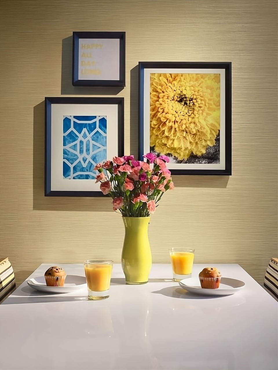 Start the day with pastries and juice at a cheerful table.