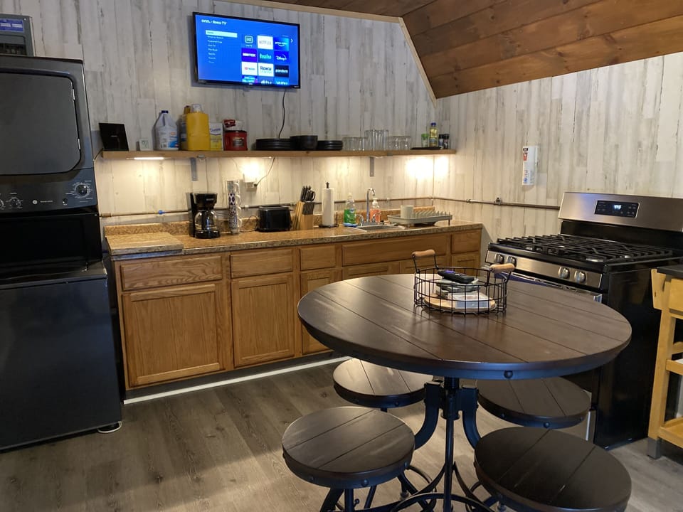 The Den communal cabin full kitchen with laundry