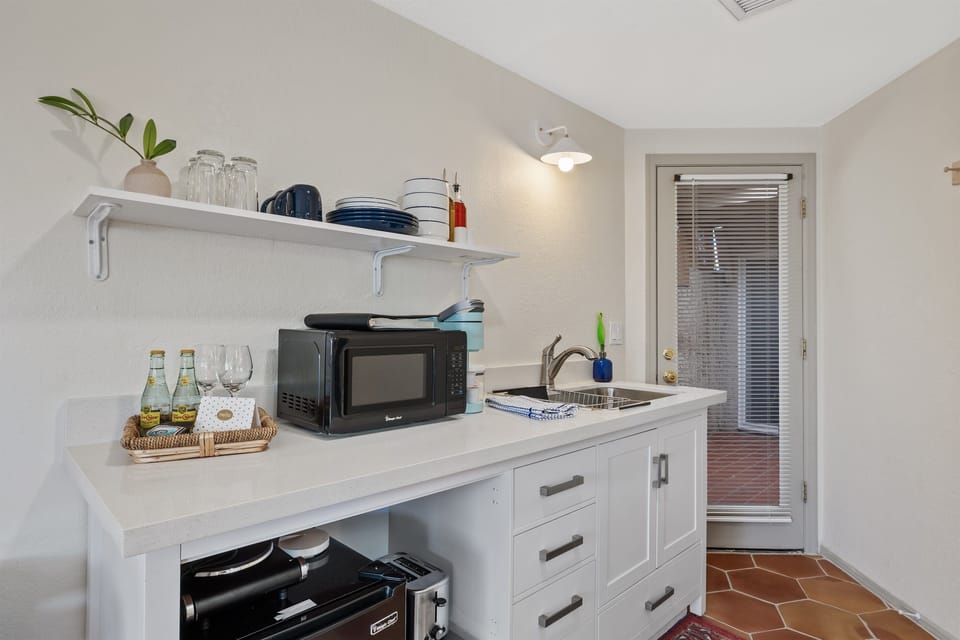 Kitchenette with all the supplies you need for basic meal prep.