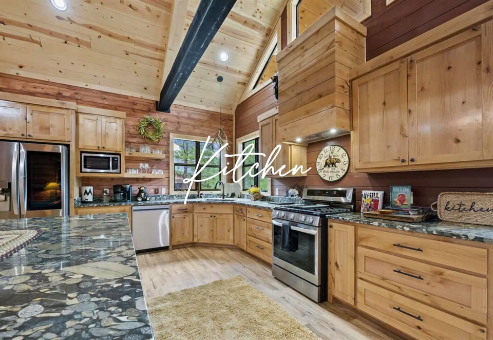 Cook up memories in this cabin's charming kitchen! Modern amenities meet rustic charm.