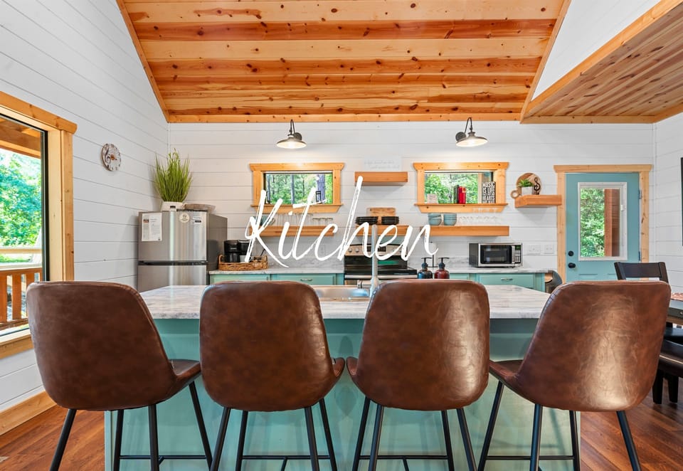 Chic and charming, our kitchen is a foodie's dream. Whether it's a quick snack or a full-course meal, cooking here is a pleasure
