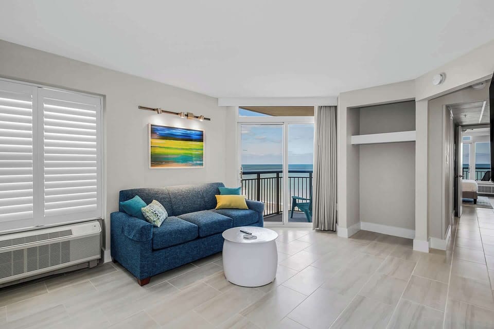 This cozy corner is perfect for unwinding. Step out onto the balcony to feel the sea breeze or relax inside while enjoying scenic views and soothing ambiance.