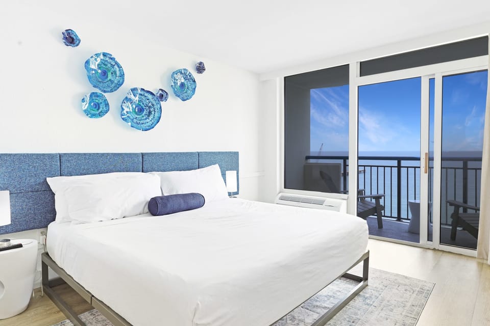Drift off into dreamland in our cozy and stylish rooms, featuring plush bedding and a calming ambiance. 