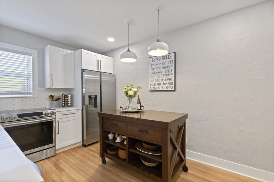 This island has wheels and two stools to maximize space