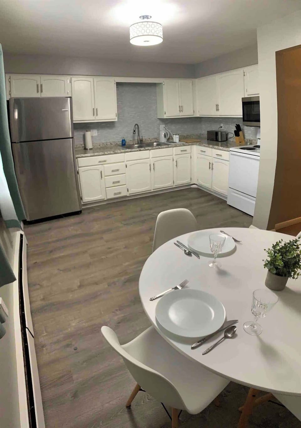 Kitchen including new appliances and furniture!