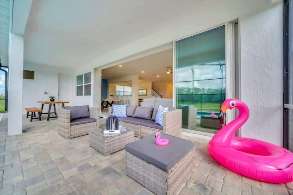 - Covered patio with outdoor seating dining table and open views
- Relaxing space for morning coffee evening chats and fresh air
- Smooth indoor outdoor flow for laid back stays  