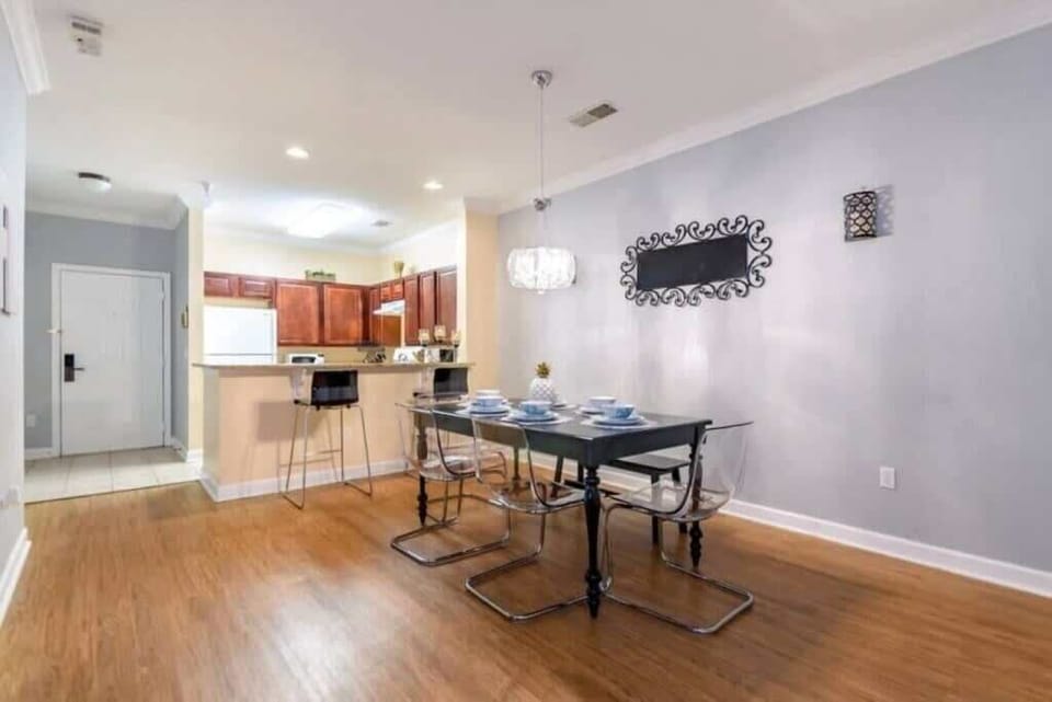 - Open dining layout flowing into the kitchen for easy gatherings
- Modern lighting and spacious seating perfect for shared meals
- Comfortable setup designed for relaxed vacation moments
