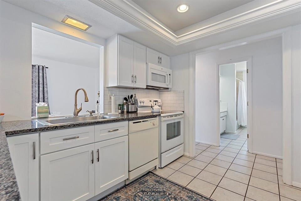 Large kitchen equipped with everything you'll need to cook your favorite meals. (Food is not provided.)