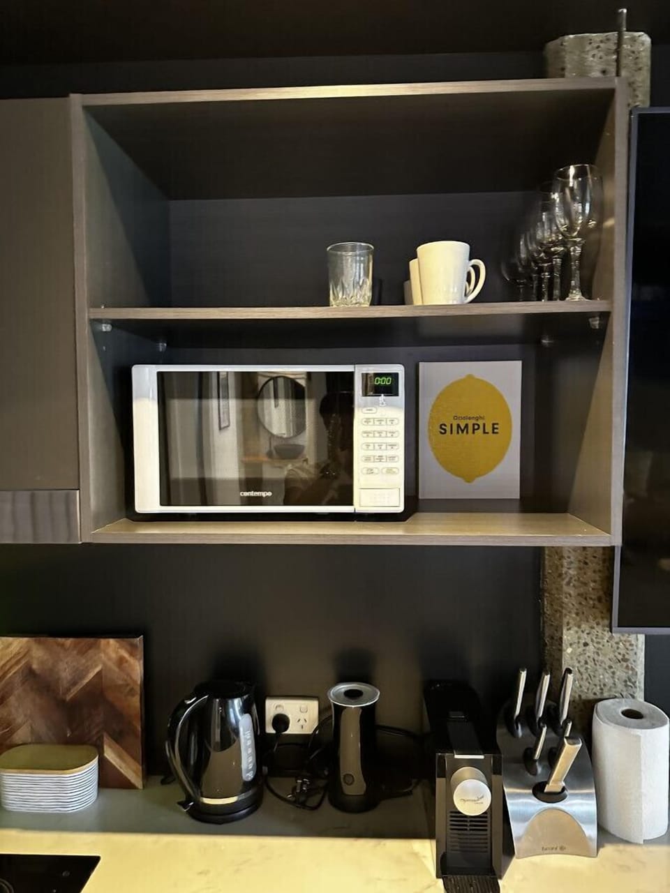 Full kitchen with kettle, toaster, microwave, coffee machine and hot plates. All plates, cutlery, pots and pans supplied.