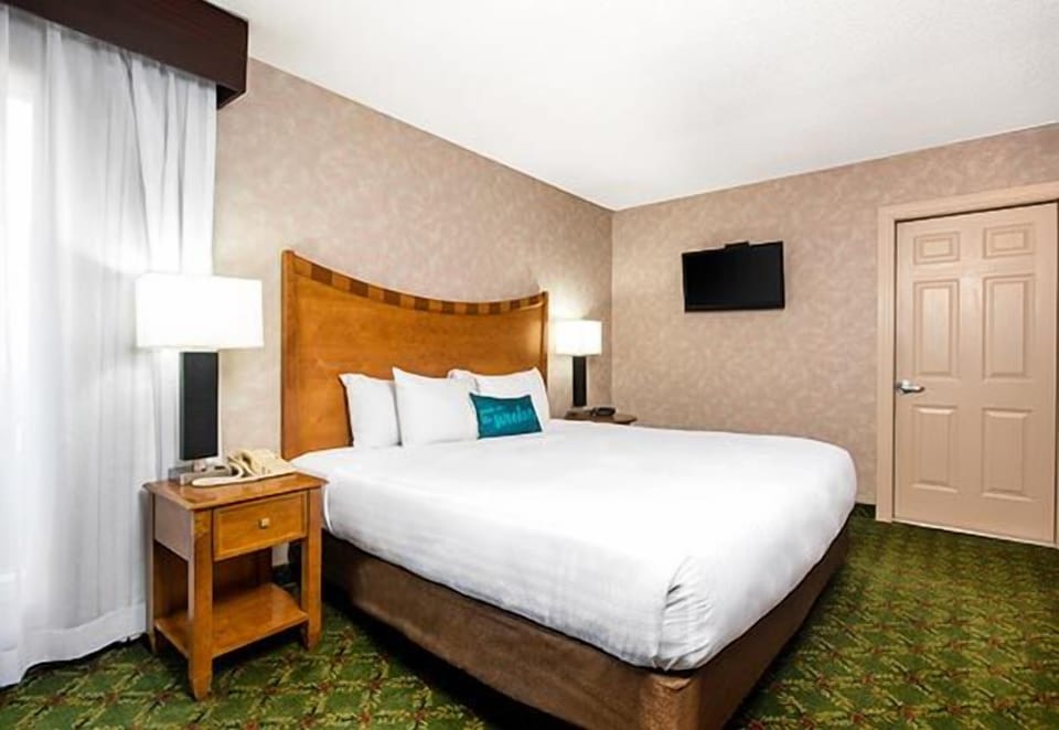 Sink into plush bedding for a quiet, restorative night.