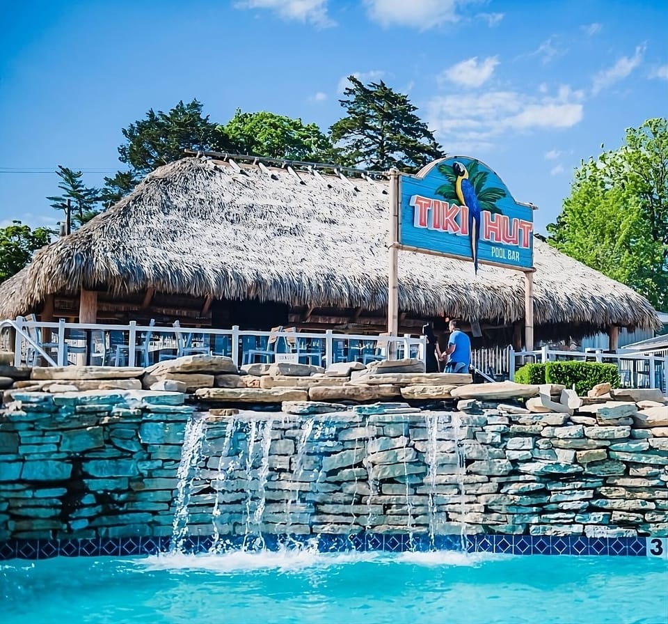 Sip tropical drinks by the lively tiki-style pool bar.
