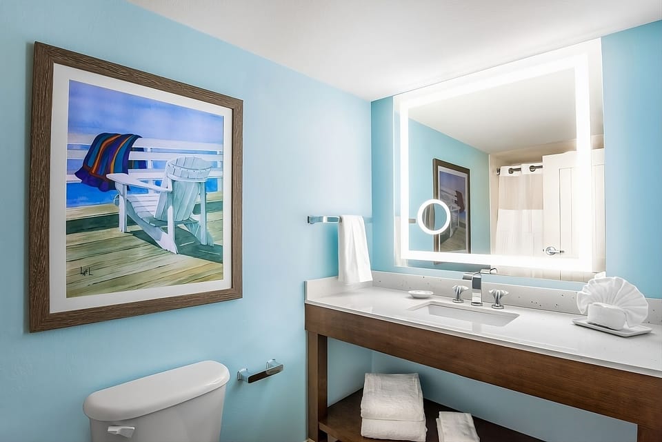 Refresh under bright vanity lights with spa-like counter space.