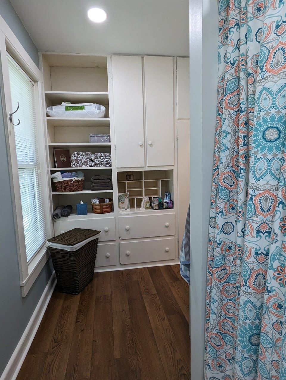 Shower and builtins in bathroom