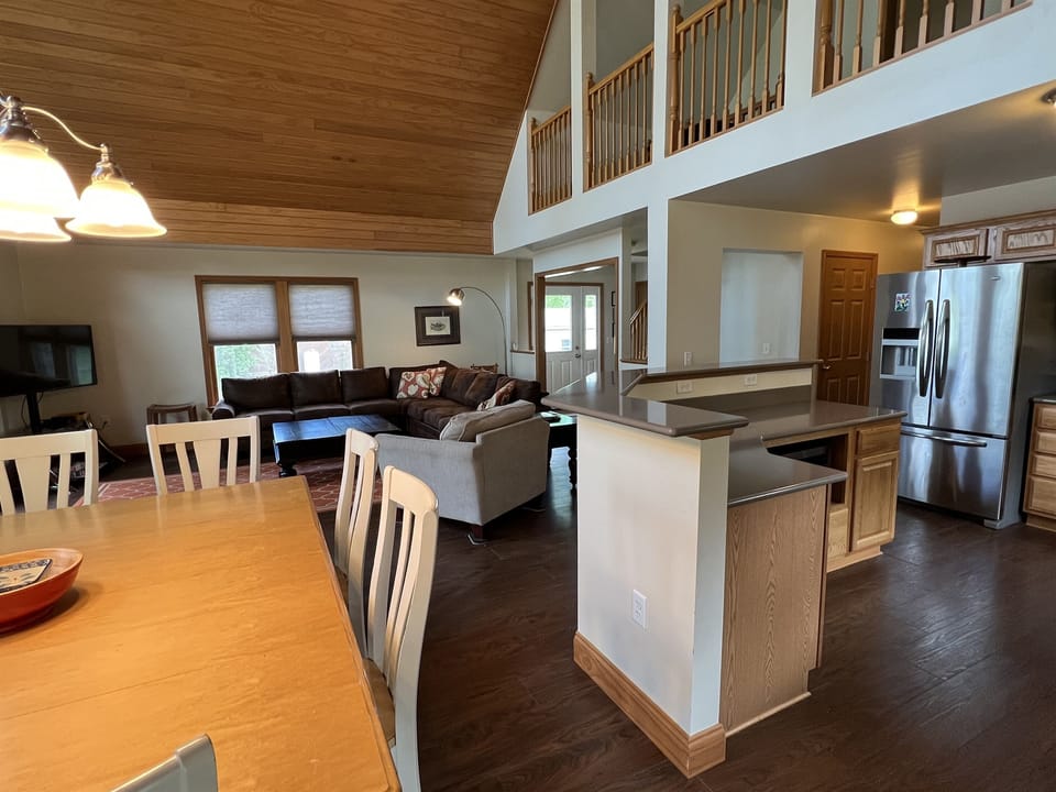 Open concept dining, kitchen, living