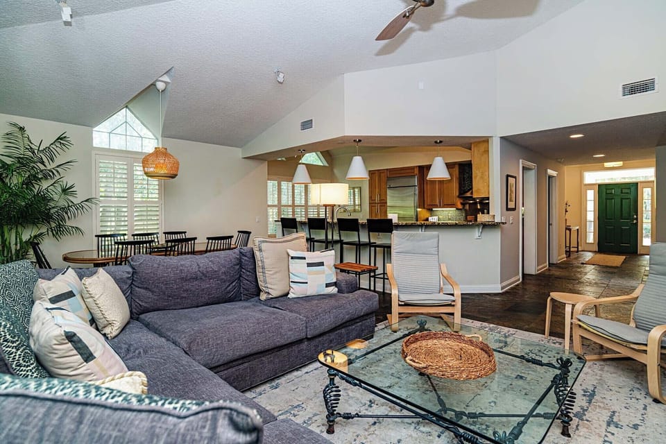 Living Area to Kitchen and Foyer