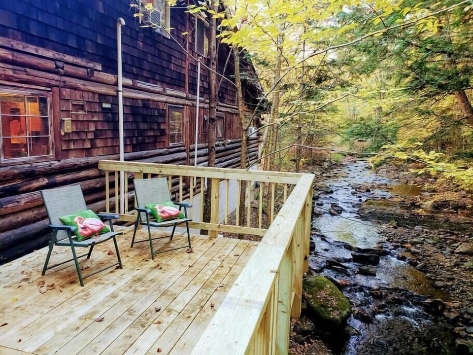 Large deck overlooking the brook. BBQ on deck just off the kitchen for convenience. Great views.