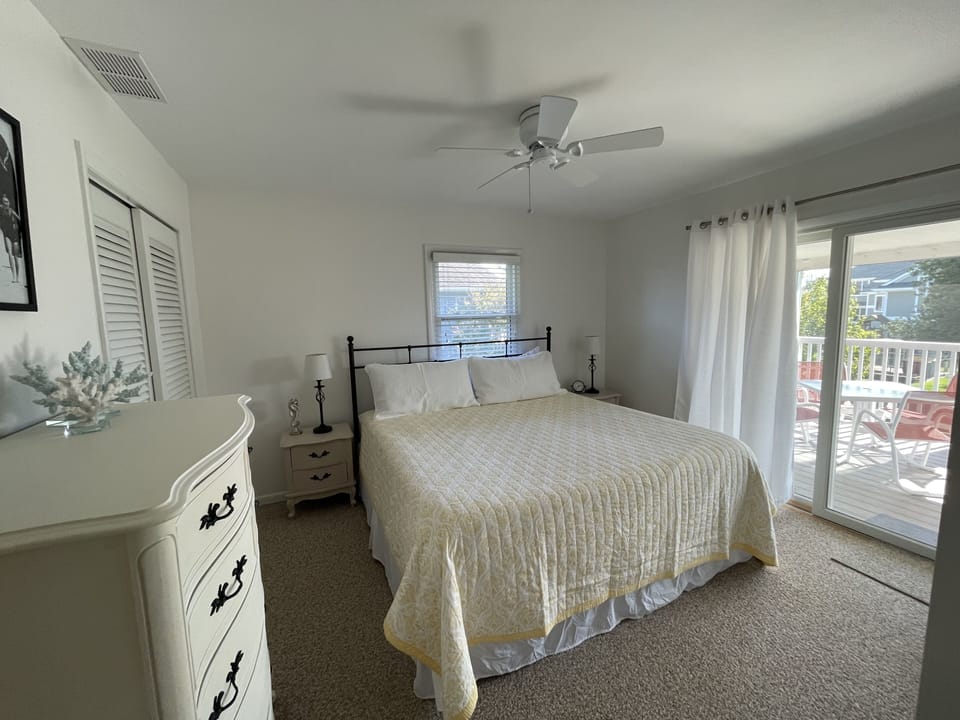 2nd Floor master with King bed and full bath, has access to back screened porch.