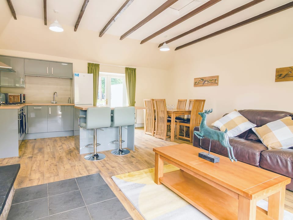 Large open plan kitchen and sitting area | Keepers Cottage - Dalnagar Castle And Cottages, Glenshee, Cairngorms
