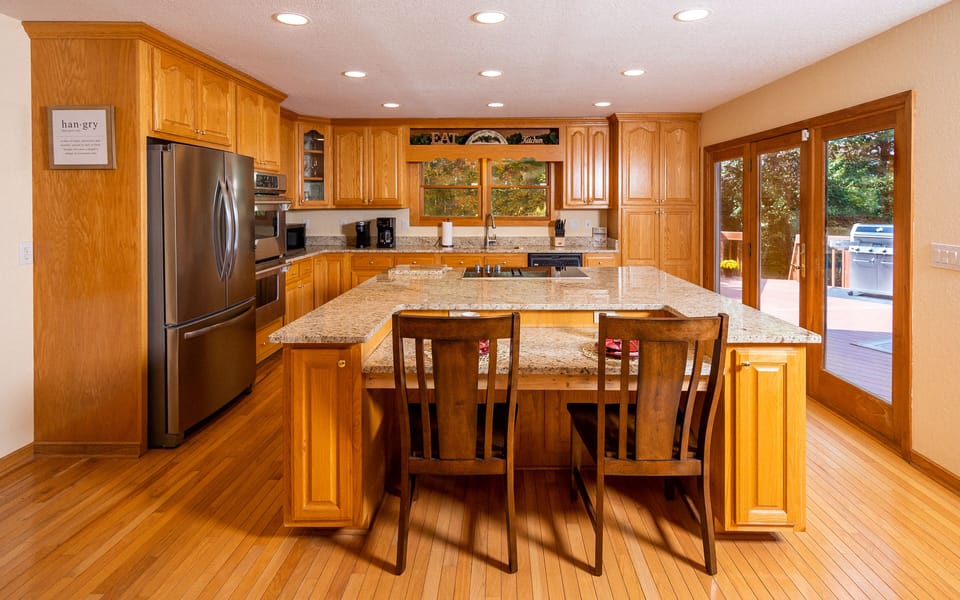 Plenty of space in this fully stocked kitchen with double ovens