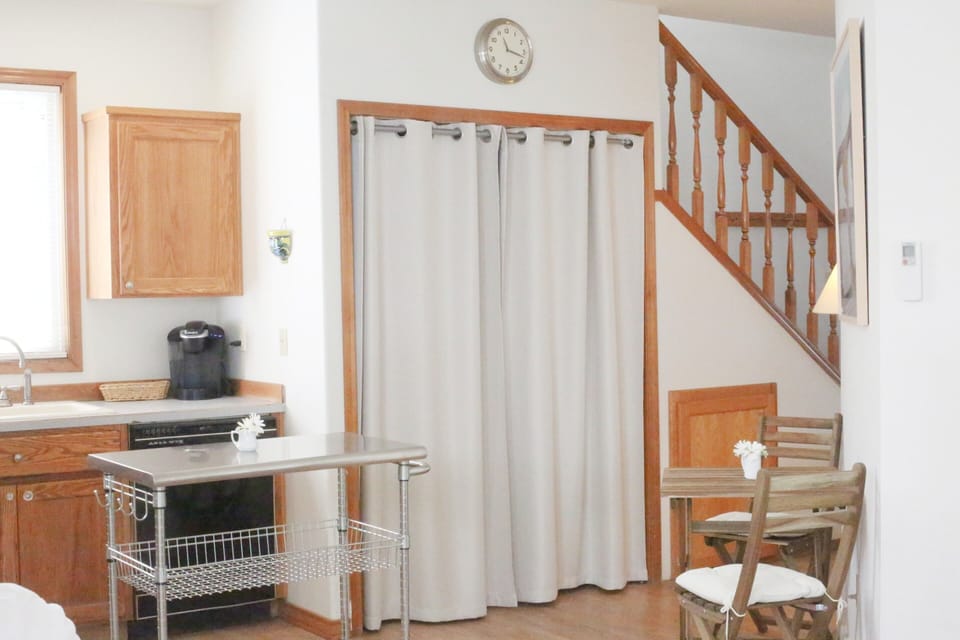 Washer & Dryer in cottage. (Well hidden behind custom made linen drapes!)