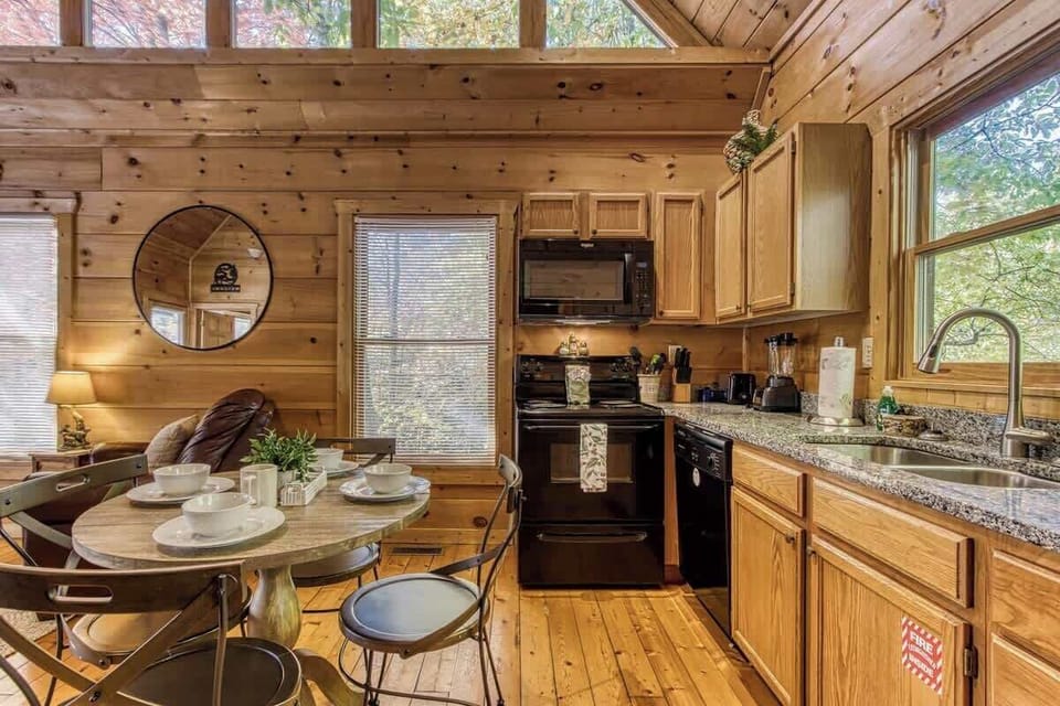 Whip up culinary delights in this bright, fully equipped kitchen with scenic views!