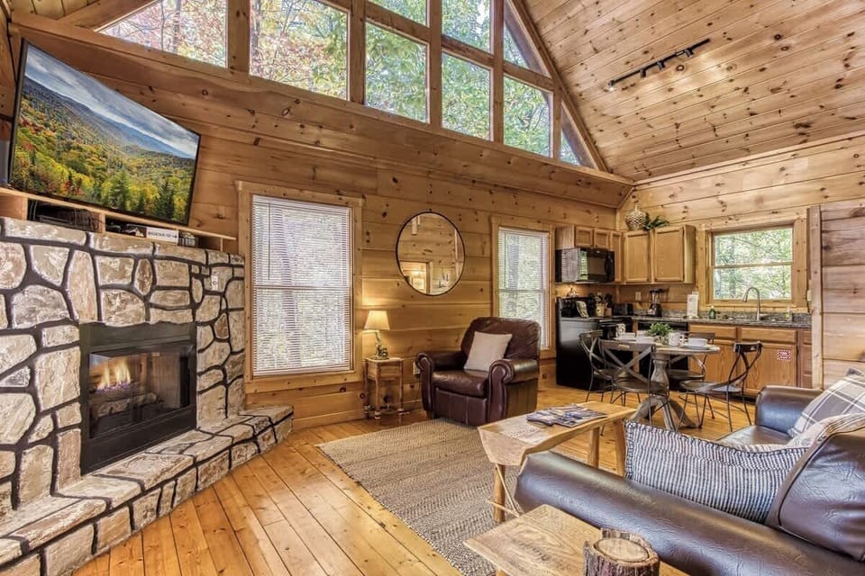  Stunning mountain views from this spacious retreat with a stone fireplace and modern decor!