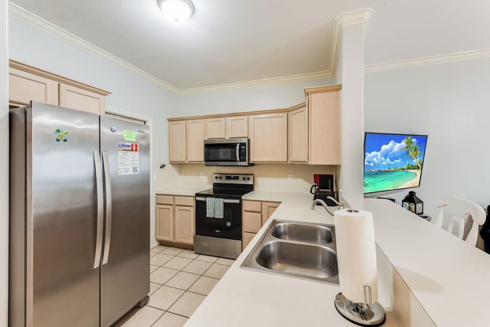 Your fully-equipped kitchen awaits with stainless steel appliances, granite countertops, and everything needed to create memorable meals during your stay.