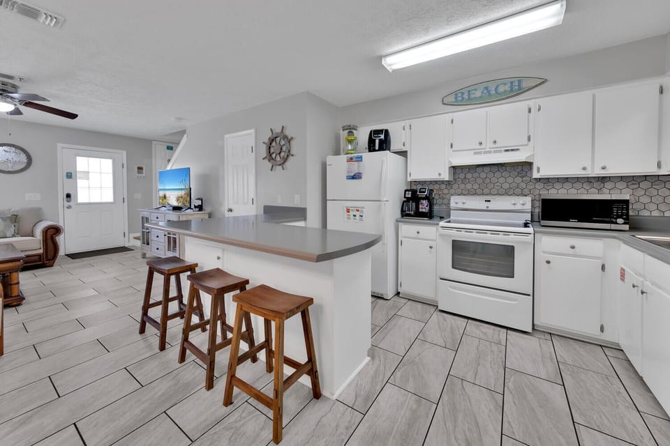 Kitchen with eat-in bar seating