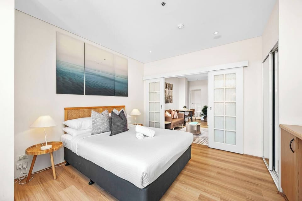 Drift away in comfort in this serene bedroom, offering a peaceful escape.