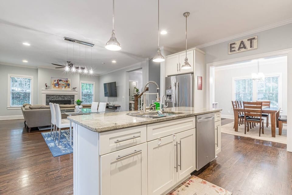 You'll feel stylish with the open floor plan and modern touches, with conversation flowing from one room to the next.