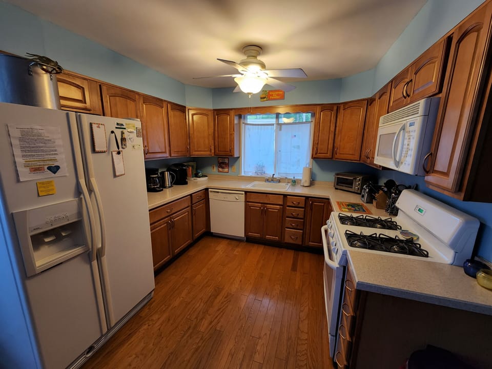 Kitchen ready for home cooking/reheat your yummy takeout. Pool passes in drawer.