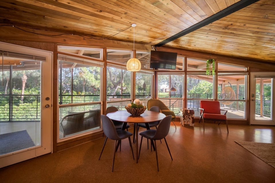 Upstairs dining, with screened in balcony