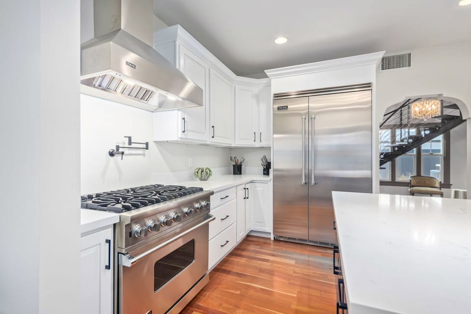 Gas range with pot filler and electric oven
