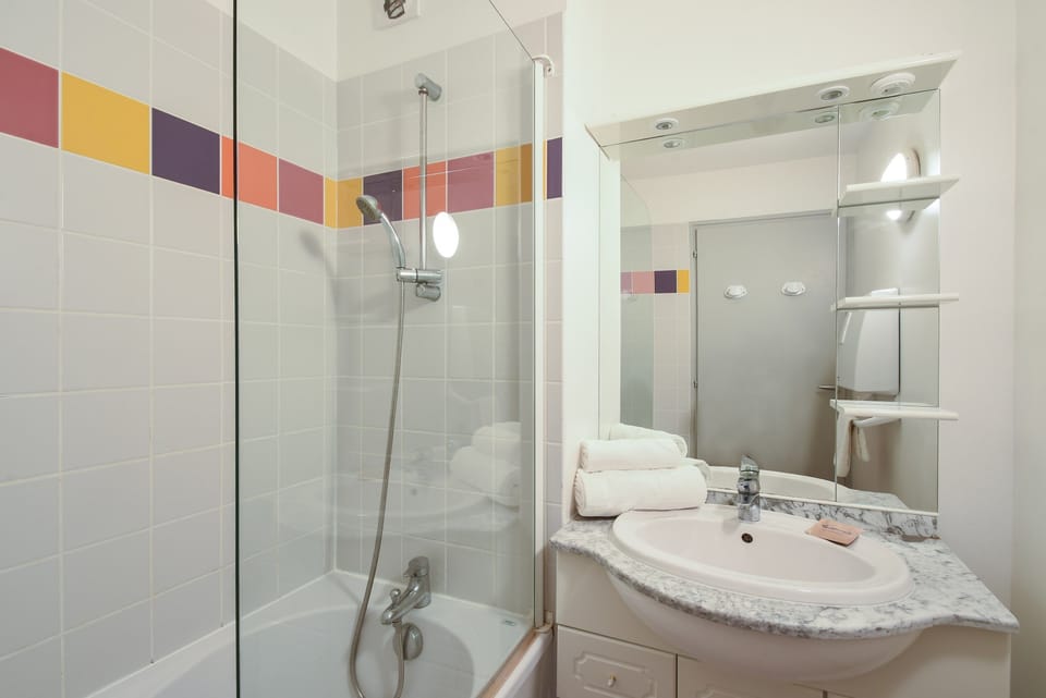 Get ready for your day in the lovely bathroom.