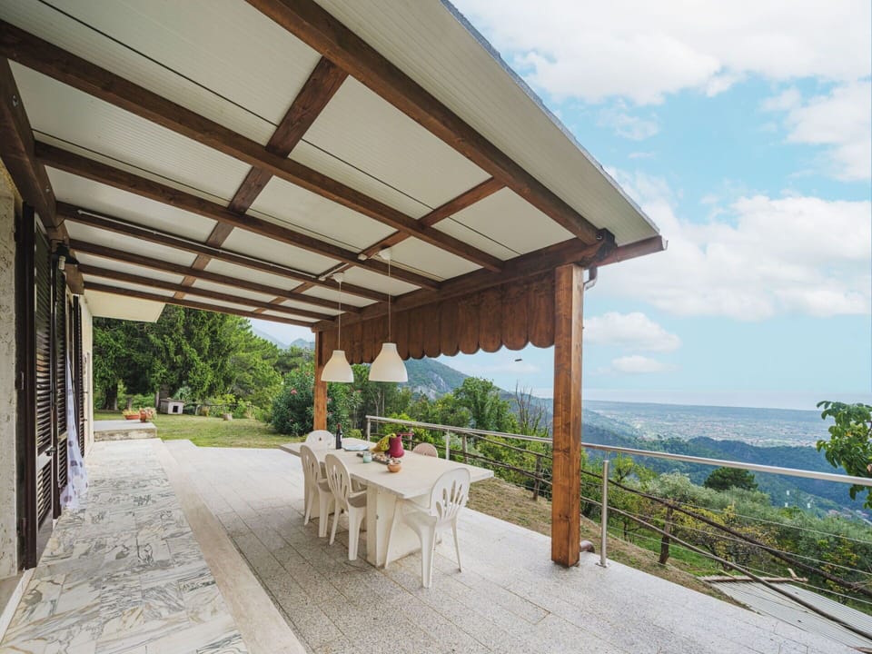 Sky, Property, Plant, Building, Cloud, Table, Shade, Outdoor Furniture, Interior Design, Porch
