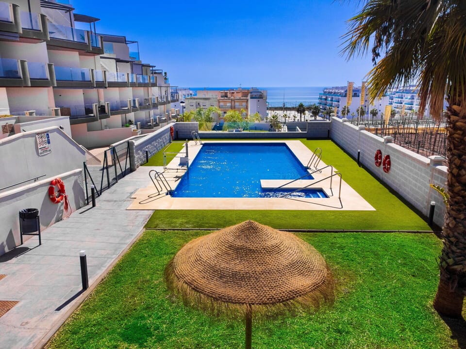 Plant, Sky, Water, Shade, Swimming Pool, Urban Design, Grass, Building, Tree, Leisure