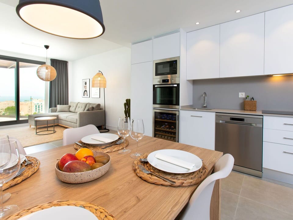 Cabinetry, Table, Furniture, Property, Countertop, Window, Wood, Chair, Interior Design, Lighting