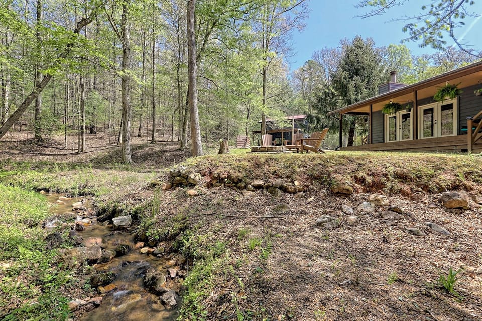 The peaceful creek wraps around the property, creating the ultimate soundtrack.