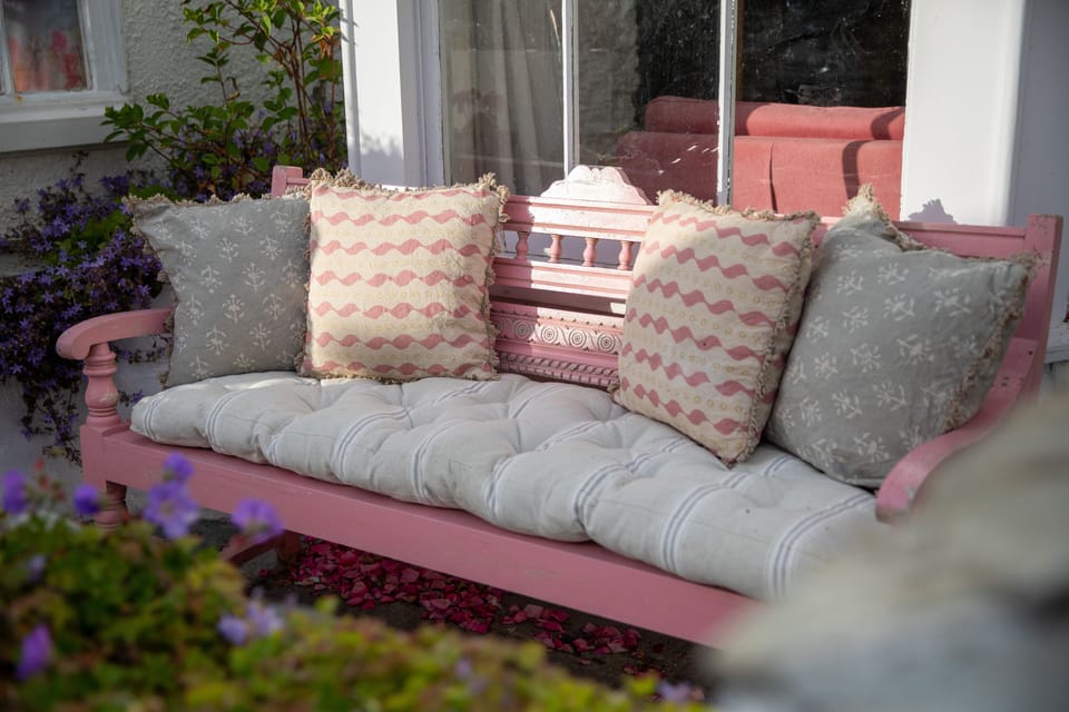 There is a large bench on the patio for reading and sun bathing.