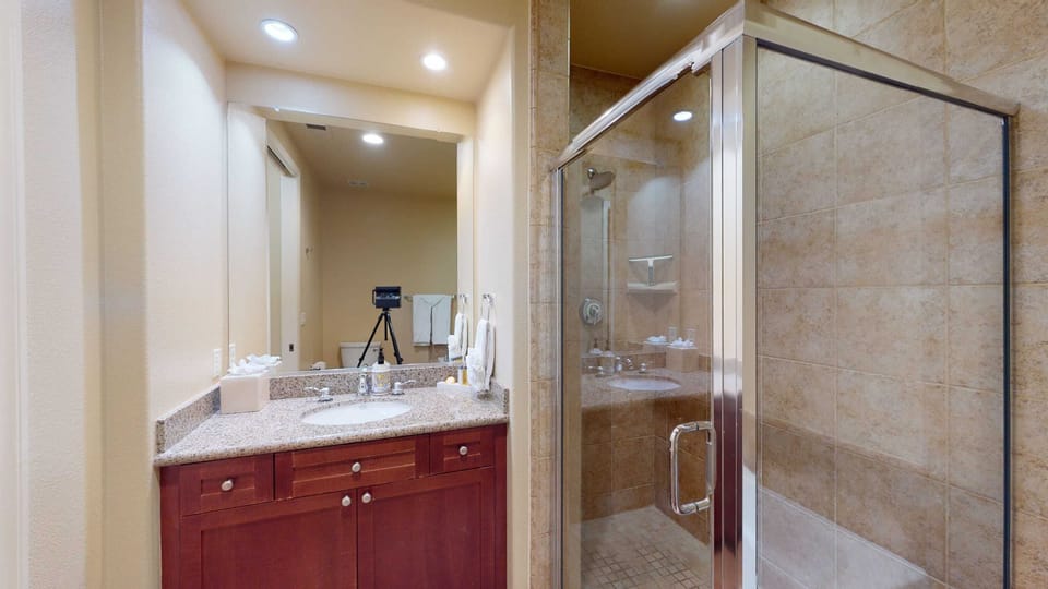 Studio Bathroom w/ Single Vanity and Walk-In Shower