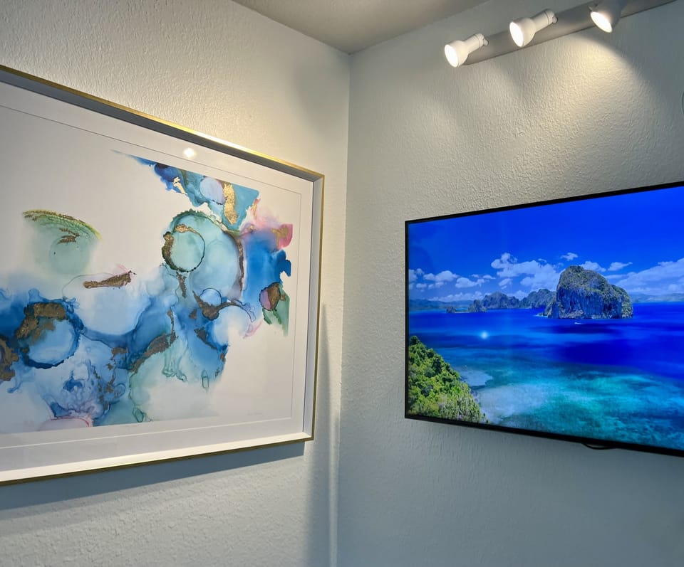 Smart TV pivots on wall mount. 