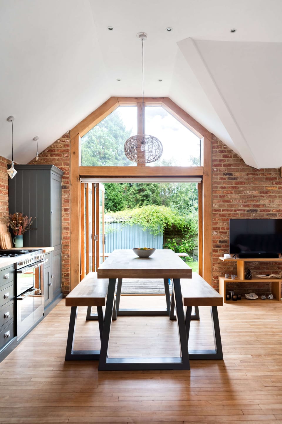 Dining table, kitchen area looking out to the garden. 