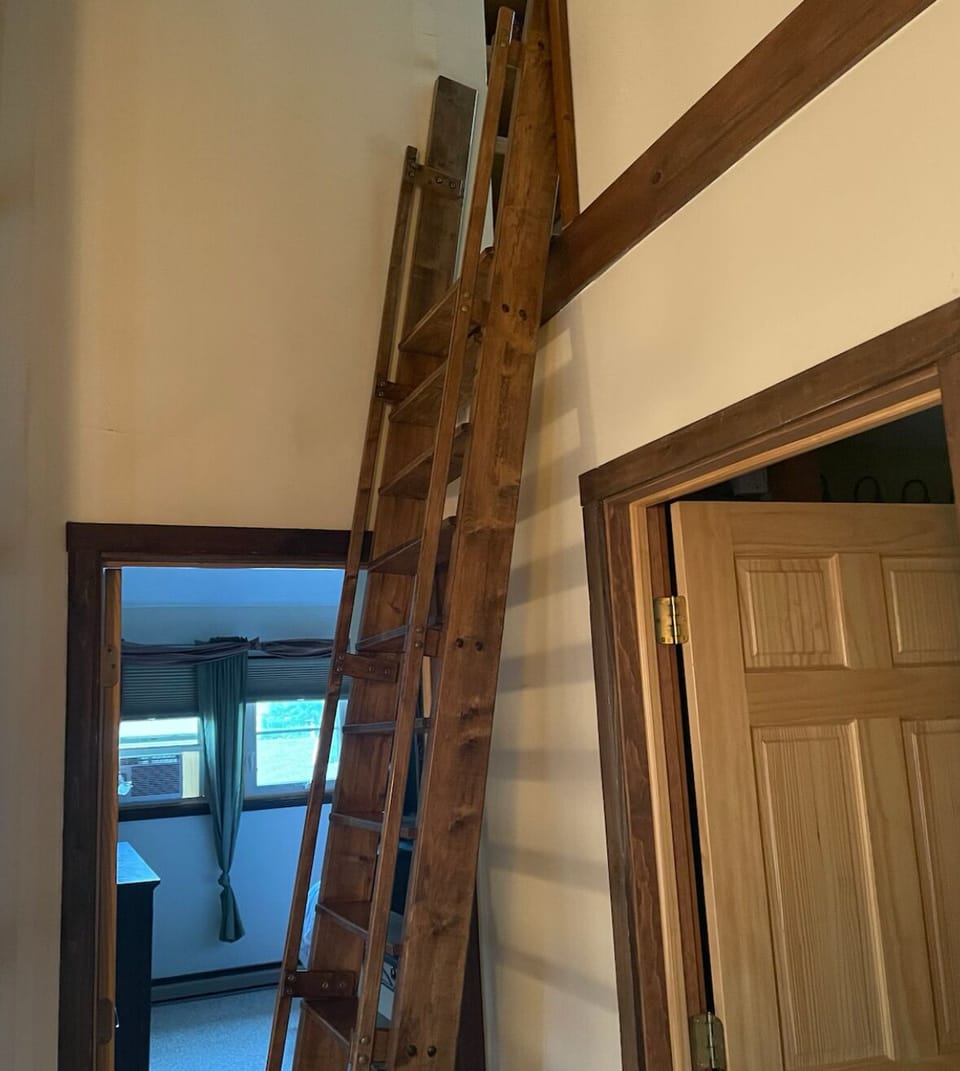 Ladder climb to loft