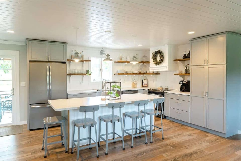 The open kitchen comes fully stocked with everything you need to enjoy your stay.